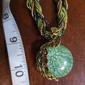 Lucky peacock follows you on this lovely green and blue seed bead necklace